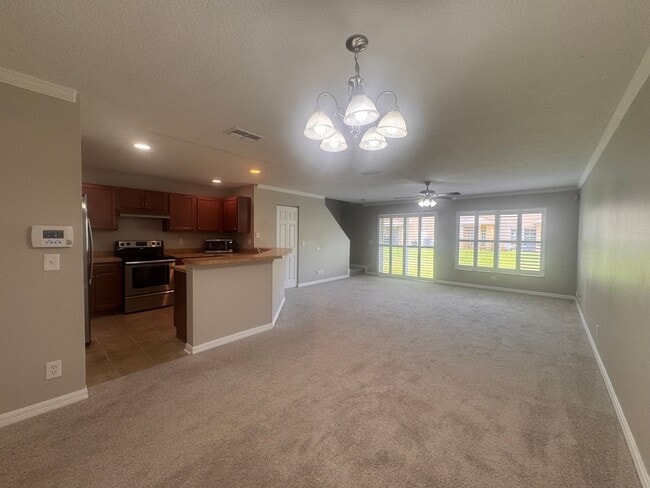 Photo - Coming Soon! 3BR/2.5BA | Newly Renovated Townhome | 1-Car Garage Parking | Community Pool!