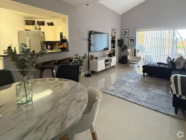 Building Photo - 9711 Fontainebleau Blvd Unit D201 Rental