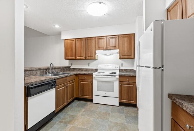 Large Kitchen with Breakfast Bar - Wilshire Manor Associates, LLP