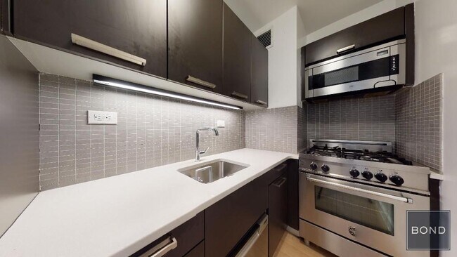Building Photo - 222 E 39th St Unit 12E Rental