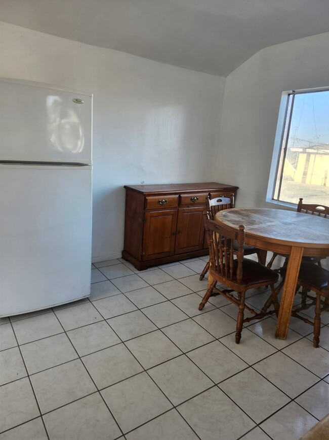 Dinning room table and chairs - 2465 250th St Unit 2465