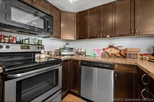 Building Photo - 117 Yacht Club Way Unit 110