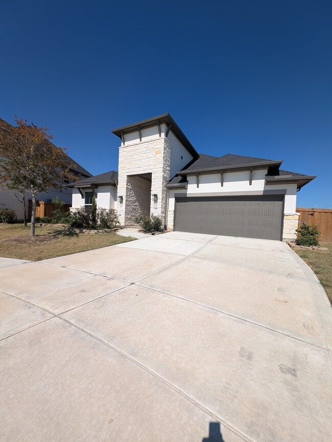 Photo - 4BR w/ Breakfast Bar • Community Pool Access • Private Backyard in Cypress