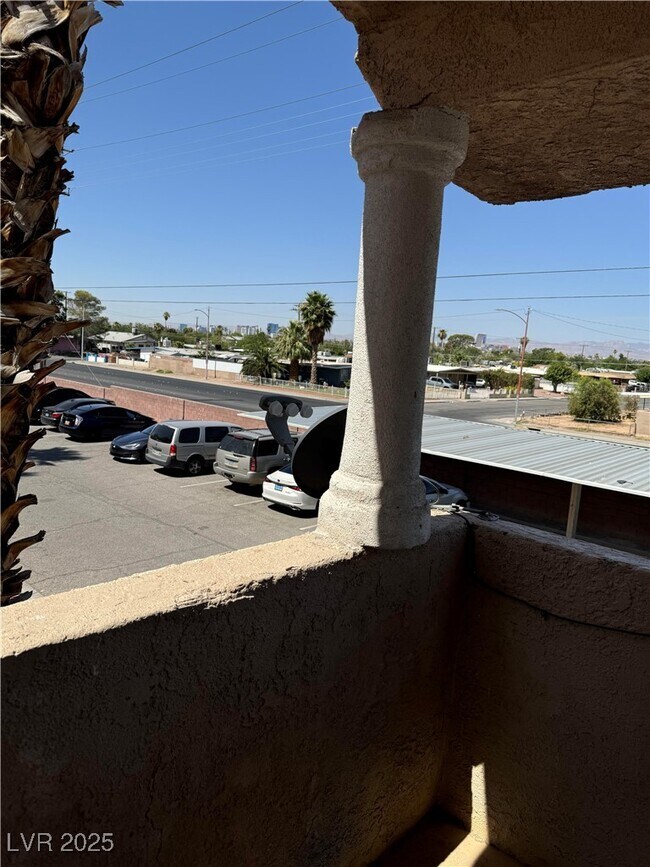 Building Photo - 1830 N Pecos Rd Unit 250