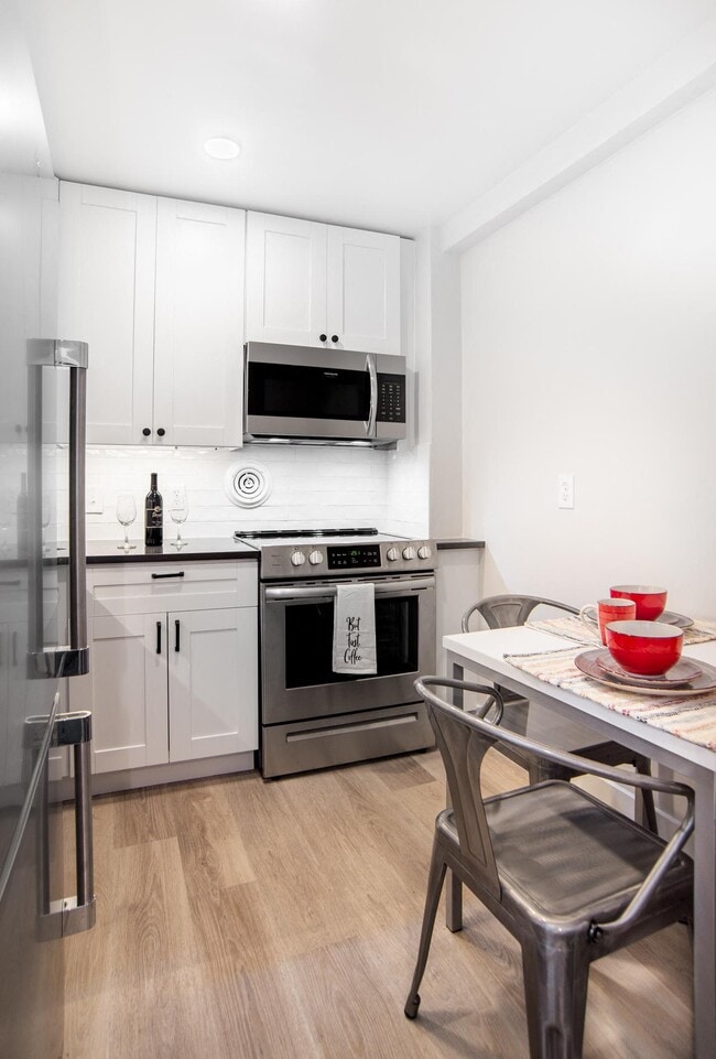Premium Package: Kitchen in the Tier 03 Studio - Circle Arms Apartments