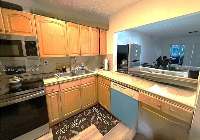 Photo - 6070 W 18th Ave Unit 209