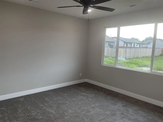 Photo - Single family slab home with three car garage. This home is 4 bedrooms, three bathrooms open floo...