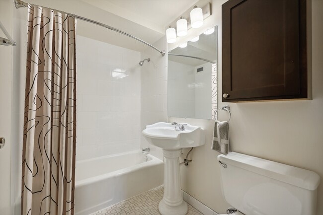 Welcome to Central Lakes of Uptown, where modern design meets comfort. This stunning bathroom features stylish fixtures and ample space, perfect for your daily routine. Step into luxury and make this your new home today!