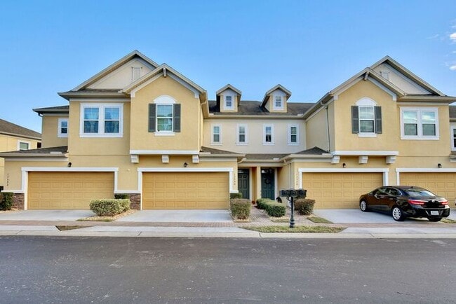Building Photo - Gorgeous 4/2.5 Spacious Townhome with a Loft Area and a 2 Car Garage in the Desirable Gated Commu...
