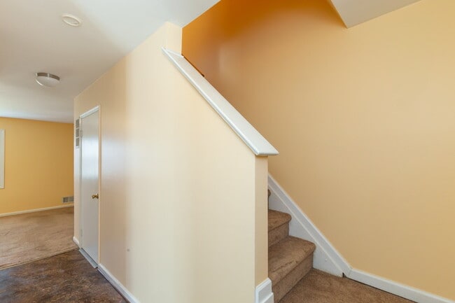 Photo - Spacious end-unit three-level townhome fea...
