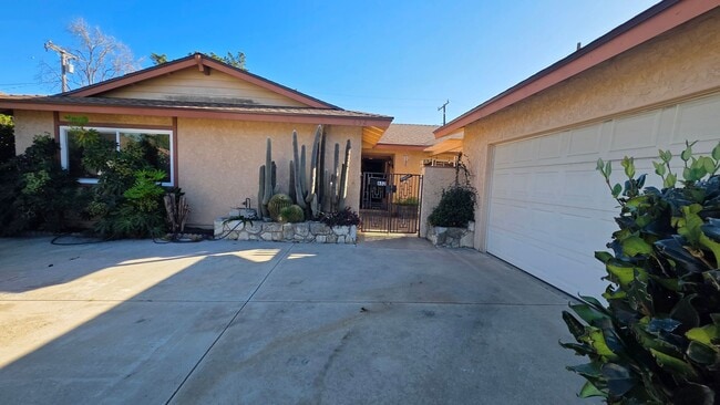 Photo - Spacious 4-Bedroom 2 Bath Home with a Large, Serene Backyard and Courtyard.