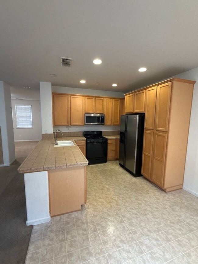 Photo - 4BR|2.5BA Townhome w/Garage|Yard| - Tenant Pays $175 monthly for WS&G