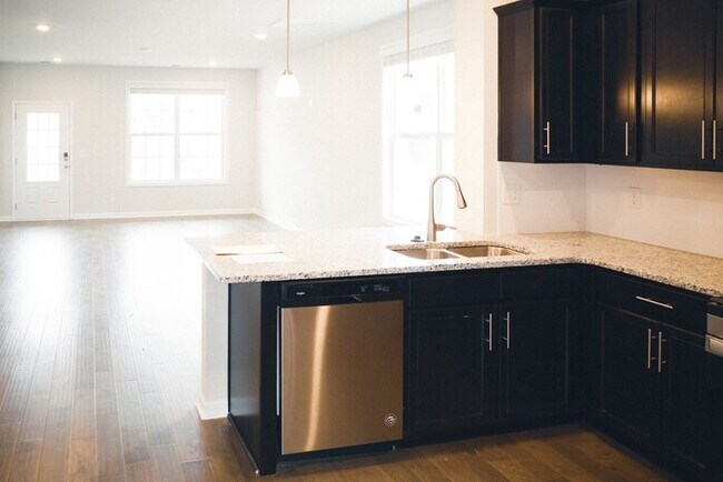 Photo - 4 Bed/ 3 Bath Townhome with Immediate Occupancy!