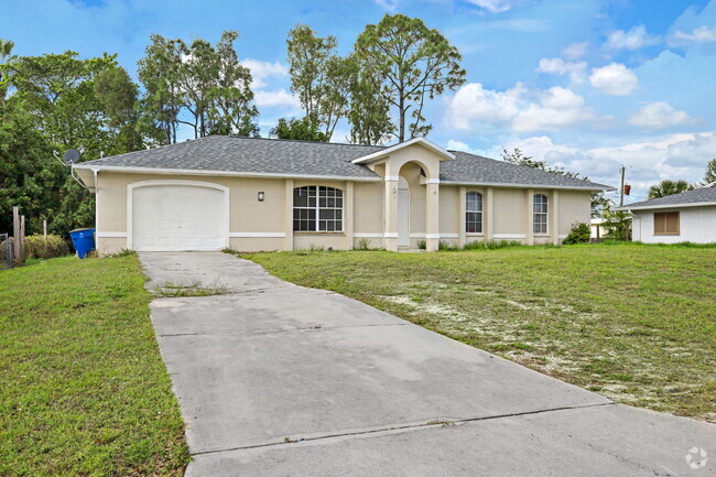 Building Photo - Charming 3-Bedroom Home in Fort Myers – An...