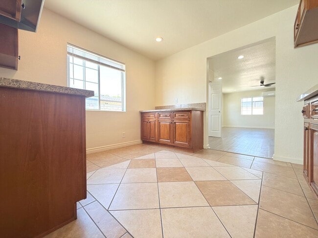 Photo - Spacious 4-Bedroom, 2-Bath Gated Home with Garage & Private Backyard