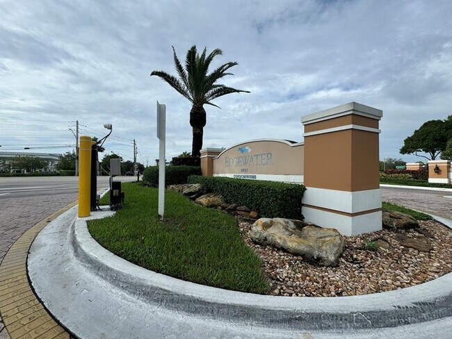 Building Photo - 9033 Wiles Rd Unit 208 Rental