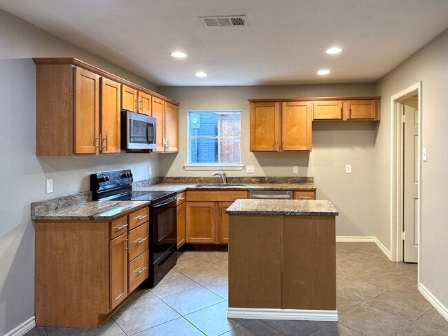 Photo - 4 Bedroom / 2 Bath / 2 Car Garage