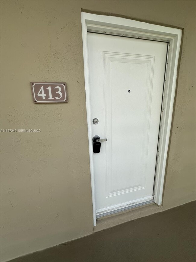 Building Photo - 7703 Camino Real Unit A413