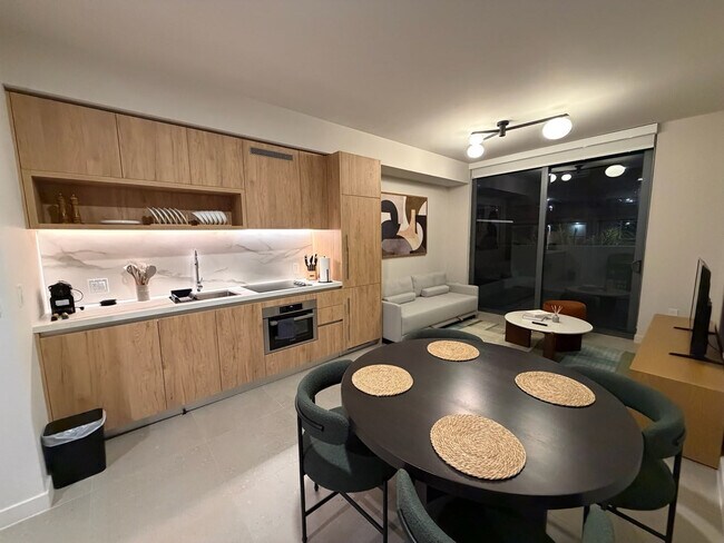 Photo - 11 NE 6th St Unidad FL2-ID1404480P