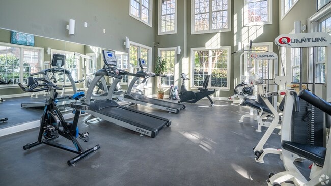 Stay active at Legacy at West Cobb Apartments in our fully-equipped fitness center featuring a range of cardio machines, weight training equipment, and a spacious layout in a naturally lit, inviting environment.