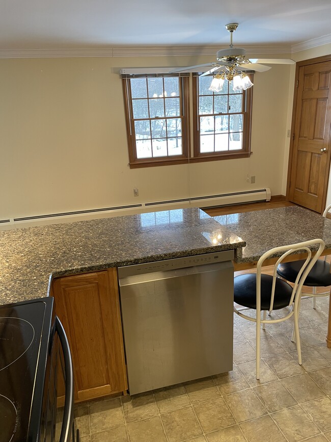 Kitchen open to eating area. Dishwasher included! - 123 Riverlin St Unit 123A