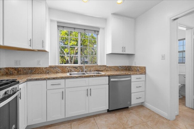 Photo - Corner lot home on a classic tree lined Beverly Hills street