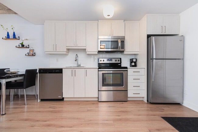 Photo - 1227 Av. de l'Hôtel-de-Ville Unit SI ID1261803P