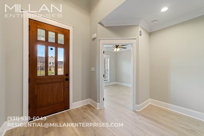 Photo - Luxury Living at Its Finest In Sango Featuring An Open Floor Plan, Fireplace and Resort Style Pri...