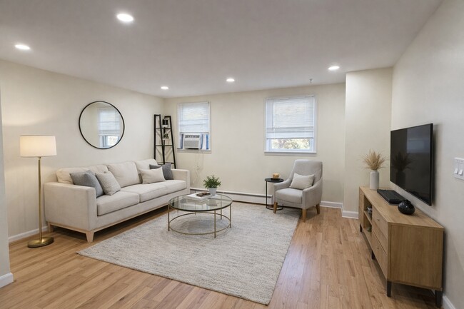 Living Room Virtually Staged to show scale. - 11 Pilgrim Ct Unit 2FL