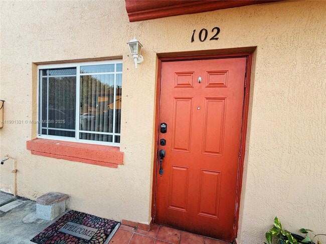 Building Photo - 17302 NW 74th Ave Unit 102