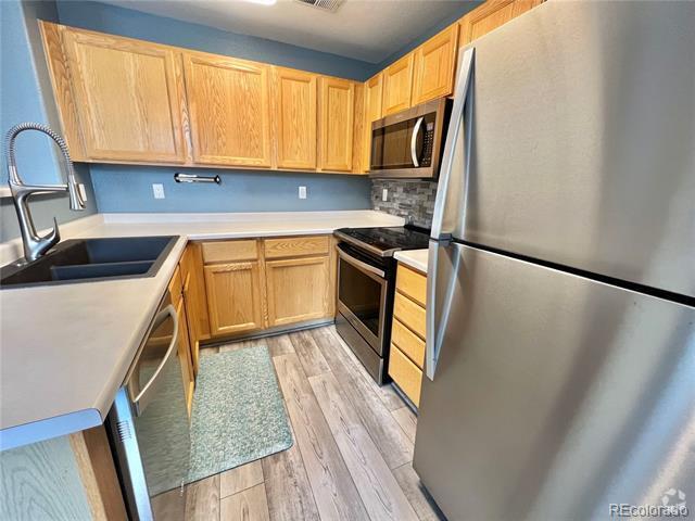 Building Photo - 8361 S Upham Way Unit 210 Rental