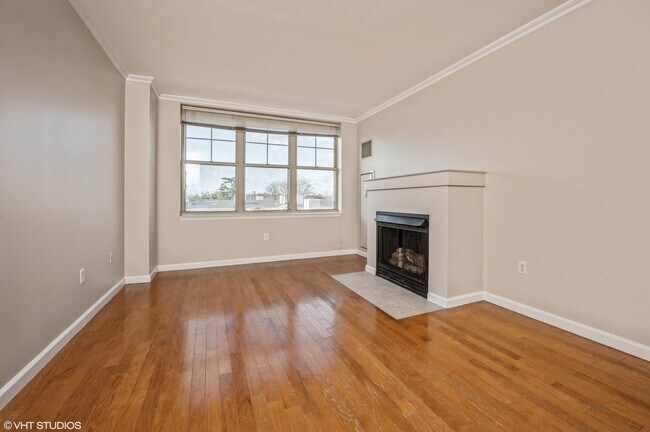 Living room with Fire Place top floor - 300 Mamaroneck Ave Condo Unit 825