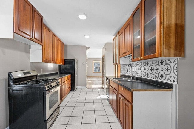 Building Photo - Large four bedroom, single family home available June 15th