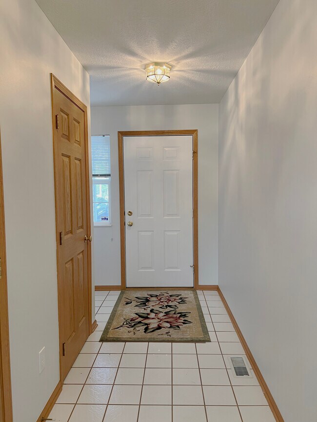 Front Hallway & Coat Closet - 319 Sycamore Ridge Way Unit 319