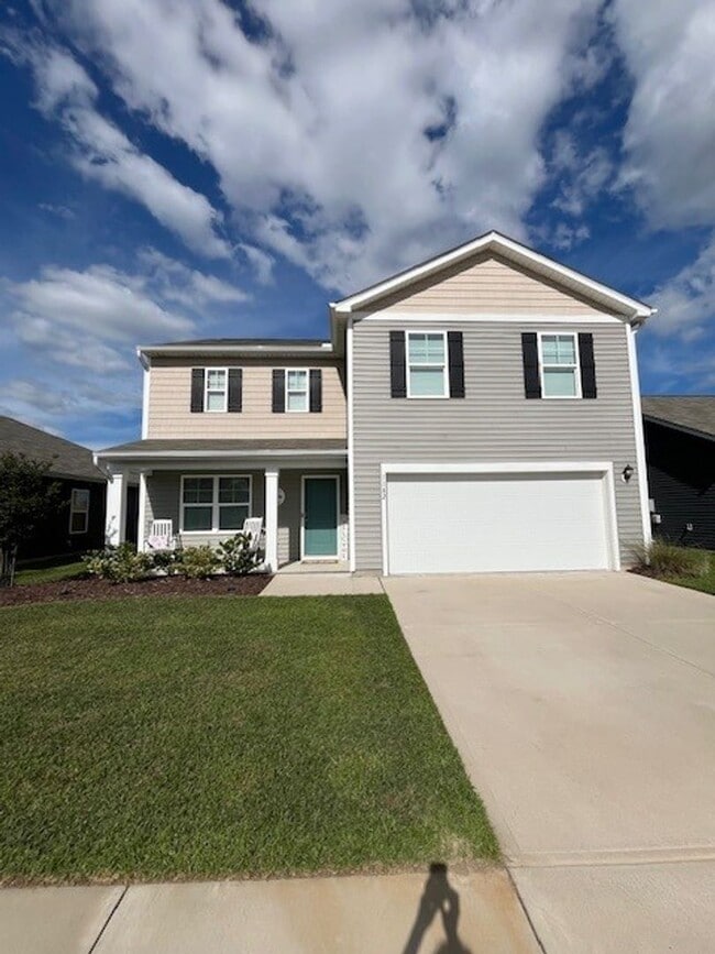 Building Photo - Discover this spacious 4-bedroom, 2.5-bath home in Winnabow, NC