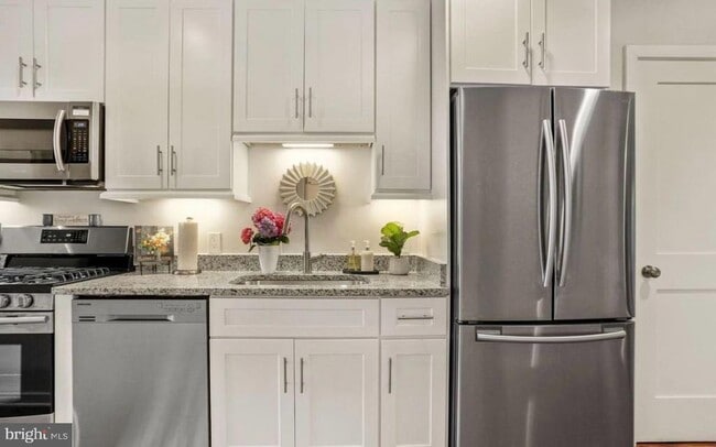 Building Photo - 5410 3rd St NW Unit 201