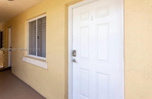 Building Photo - 12625 SW 91st St Unit 203