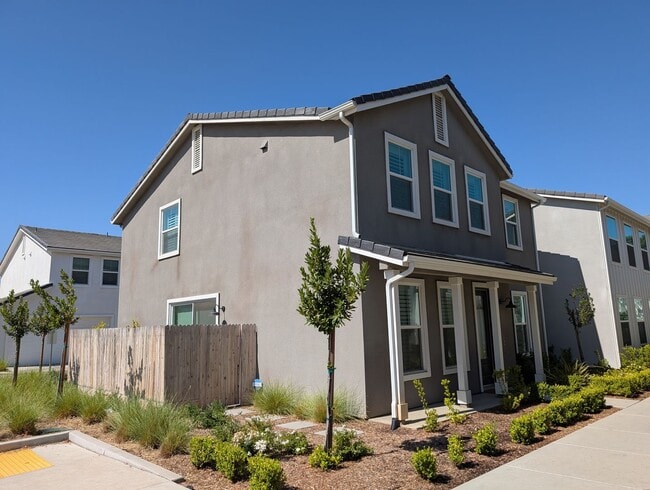 Photo - Modern home in a modern community featuring upgraded amities, solar, community pool + Close to Co...