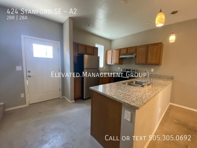 Building Photo - 424 Stanford Dr SE Unit A2