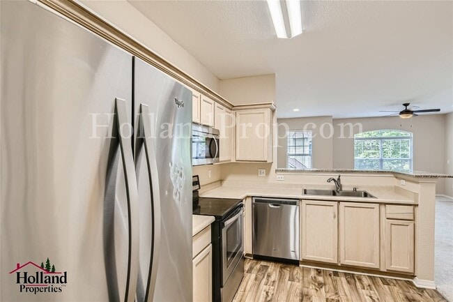 Photo - Comfort Meets Convenience: Updated 2-Bed Condo with Garage & Pool