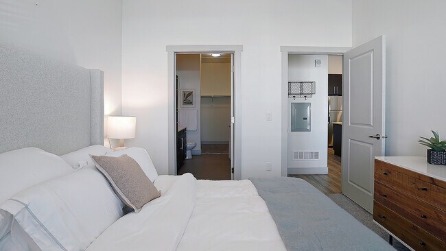 Comfortable bedroom layout with direct access to the bathroom.