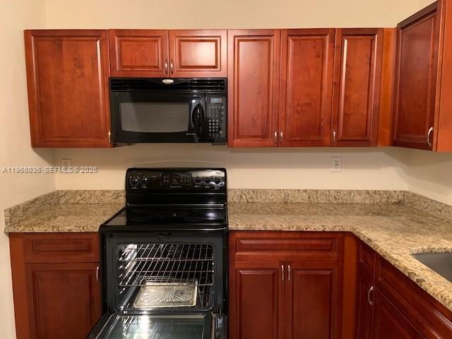 Building Photo - 731 N Pine Island Rd Unit 305