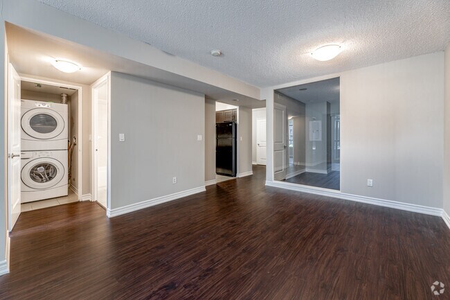 2BR + Den, 1BA - 780SF - Living Room - WestQ