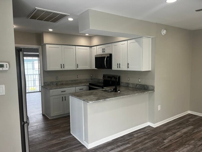Photo - Totally Renovated and a Walk to the Beach!