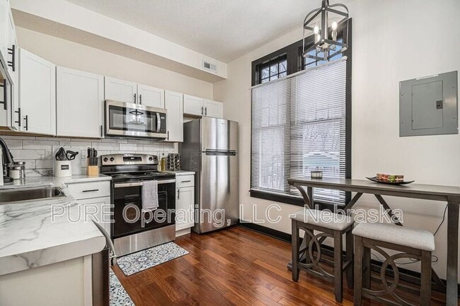 Building Photo - 2518 Woolworth Ave Unit 2 Rental