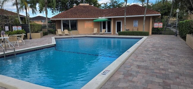 Building Photo - 10416 NW 8th St Unit 201