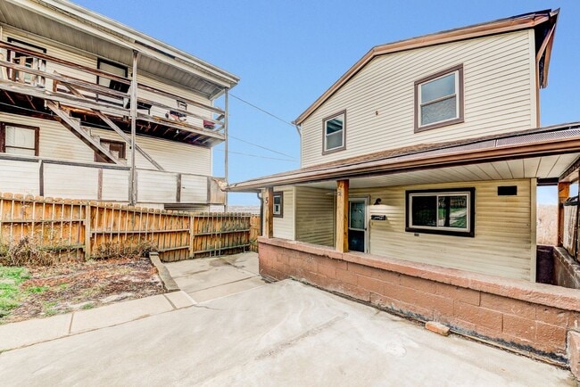 Photo - AVAILABLE JUNE 2026 -  4 Bedroom Full Renovation w/ Stunning Hilltop View & Central AC!