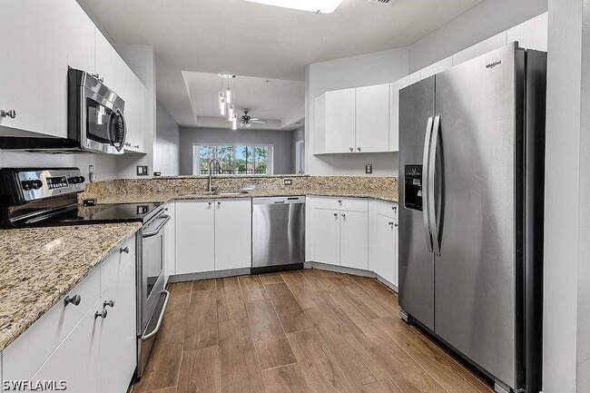 Building Photo - 7827 Regal Heron Cir Unit 306