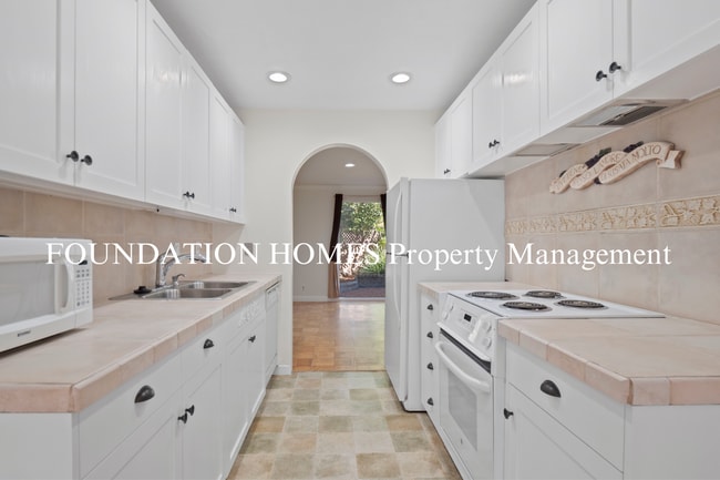 Photo - Bright & Tranquil End Unit! A/C! Parking! Community Pool! FOUNDATION