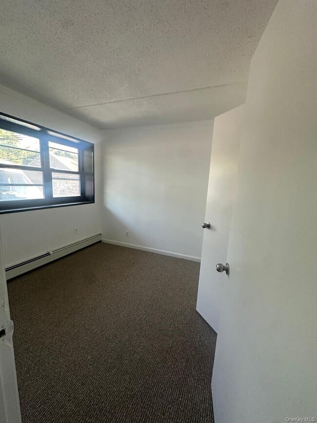 Photo - 56-11 Clover Pl Unit 102